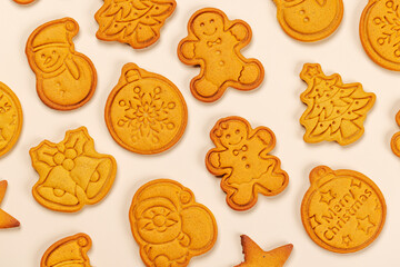 Christmas ginger cookies on beige background