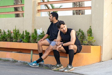 Asian Indonesian Men Resting After Outdoor Running Exercise
