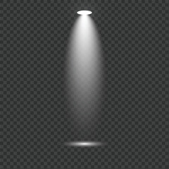 Bright spotlight shining down creating a focused beam of light