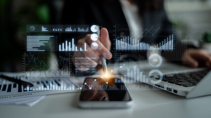 A dedicated business professional reviews key data trends using advanced analytics on a smartphone...