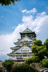 Main tower of Osaka Castle in Japan on sunny day