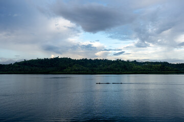 Sunset canoe ride in the Togian Islands, Sulawesi, Indonesia