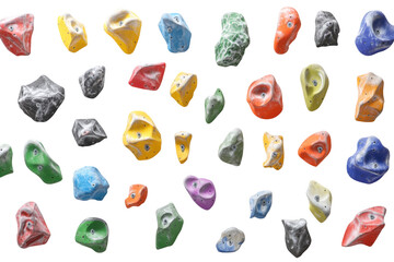 Collection of colorful climbing holds isolated on transparent background. Rock climbing wall with colorful rock climbing holds isolated on white background.