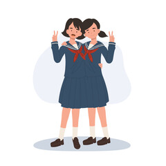 full length of japanese schoolgirls in sailor uniform making peace sign friendship.