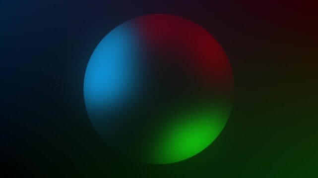 A motion graphics animation of a sphere in vivid red, blue, and green colors at the center on a dark background, while its surface continuously shifts and morphs in a continuous loop