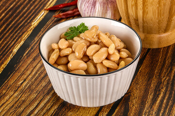 Baked white canned beans in the bowl