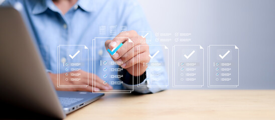 Businessman showing online document validation icon, quality assessment management With a...