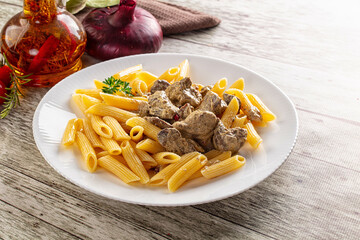 Italian pasta penne with chicken liver
