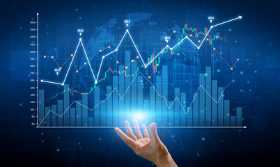 A hand reaching out towards a financial growth chart symbolizes aspiration and achievement in...