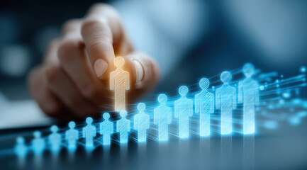 Hand selects talent from digital workforce icons representing recruitment management strategy.