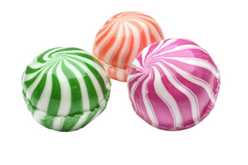Swirl candies in green pink and orange isolated on transparent background. Colorful candy balls sweets isolated on white background.