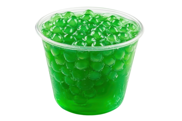 Green tapioca pearls in a clear cup isolated on transparent background. Delicious bubble with tapioca pearls served in clear cup isolated on white background.