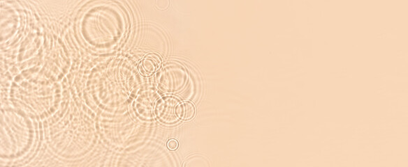 water texture ripples wave clean transparent water abstract background in beige color