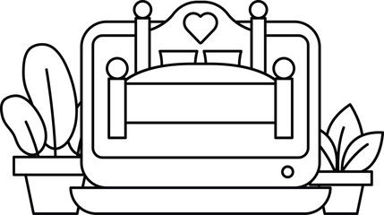 A bed with a heart on it is on a table