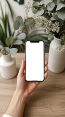 Hand-Emphasized Smartphone in Minimalist White Studio