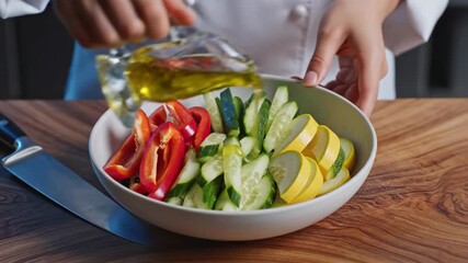 Culinary professional slicing fresh bell pepper on wooden cutting board in commercial kitchen - Powered by Adobe