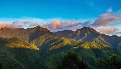 sunrise over the mountains with blue sky background
