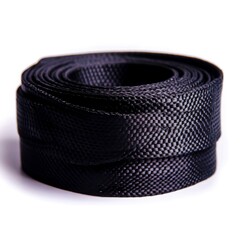 Black Textured Strap Rolled Up on White Background for Craft and Design Use