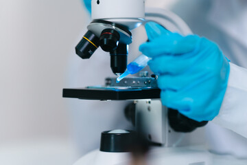 Scientists research biochemical solutions in a lab for health care advancements