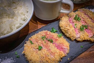 Japanese food Tonkatsu fried pork and rice on the plate