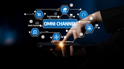 A hand interacts with a smartphone screen showcasing omni channel marketing concepts, representing a modern approach to customer engagement and digital strategy. Tessel