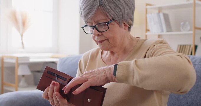 Senior aged mature grey haired woman feeling stressed without money, having financial problems, suffering from lack of money bankruptcy, single retired female, old lady feels distressed looks helpless