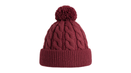 Cozy maroon cable knit beanie hat with a fluffy pom-pom and ribbed cuff, perfect for winter warmth. background removed