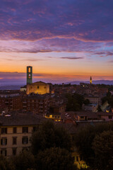 Beautiful purple clouds over Perugia historical center just before dawn