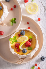 Tasty New York cheesecake made of citrus fruits and vanilla.