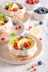 Sweet New York cheesecake with cottage cheese and berries.