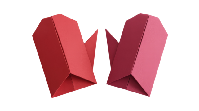 Two abstract geometric shapes, one vibrant red and one deep pink, stand with sharp angles and polygonal facets on a solid transparent background. background removed