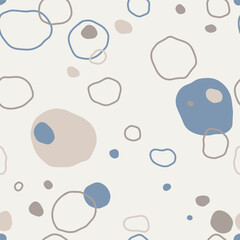 Abstract illustration features irregular circles and spots in soft tones of blue, beige, gray, and cream. 