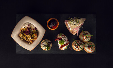 Minimalist presentation of assorted gourmet appetizers