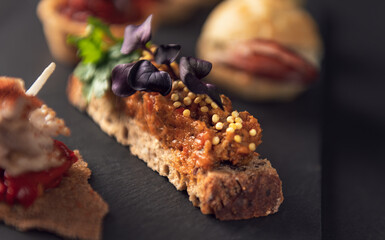 Gourmet toast with vegetable spread and mustard seeds