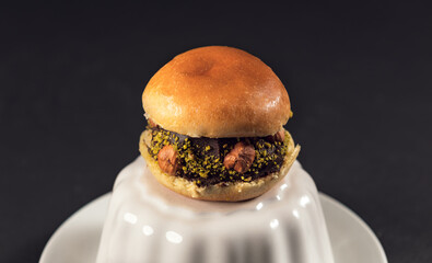 Close up dessert burger with chocolate and pistachio
