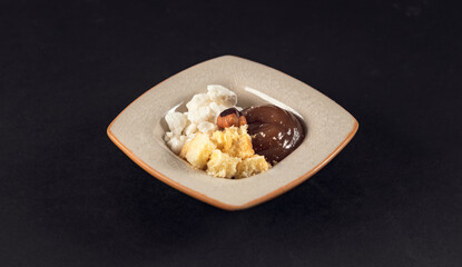 Deconstructed chocolate hazelnut dessert on square plate
