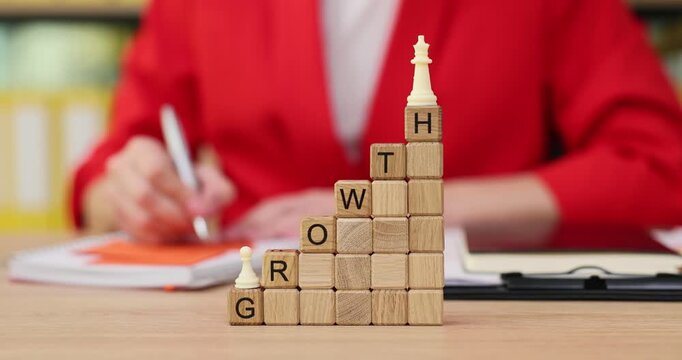 Creative stacking of blocks with words in a bright workspace showcasing focus and inspiration at noon