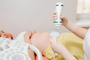 Ultrasound Gel Application. Ultrasound gel is applied to the transducer for effective soundwave...