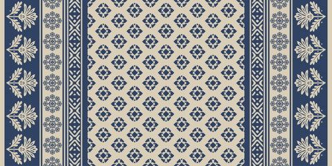  Traditional ethnic floral embroidery pattern with beige motifs on blue background, inspired by Indian saree textile design, perfect for clothing, carpet, fabric, decoration, and fashion artwork. © supachai