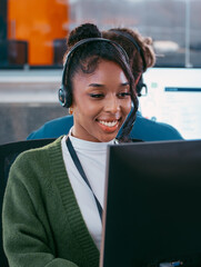 Expert Female Customer service representative agent working in Call Center office. Female Consultant, IT Support Operator working on desktop computer helping, talking with Client, Contact support.