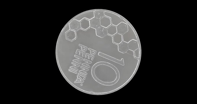 Reverse of Finland coin 10 penni 2000, isolated in black background. Loopable animation in 4k resolution video