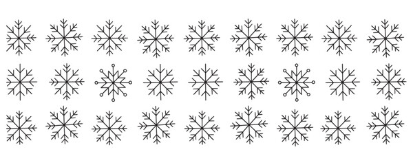 Delicate snowflakes arranged in rows create a winter wonderland pattern perfect for holiday cards or festive backgrounds and seasonal designs
