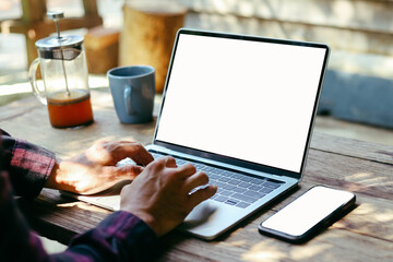 computer screen,mobile phone blank mockup.work using laptop texting mobile.white background for advertising,contact business search information on desk in cafe.marketing,design