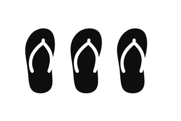 Simple black flip flops arranged in a row for summer fashion and beach outings