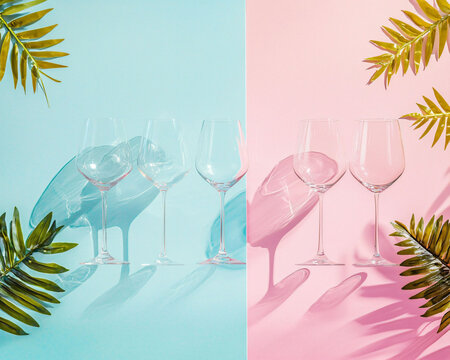 Elegant Wine Glasses with Leaves on Colorful Backgrounds