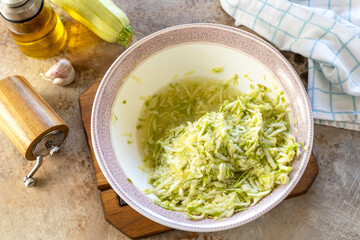 Step-by-step cooking recipe zucchini roll with mushroom filling.