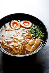 Ramen soup on a plain background isolated in backlight