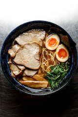 Ramen soup on a plain background isolated in backlight