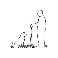 Silhouette of a person and dog in a grassy field with a walking stick