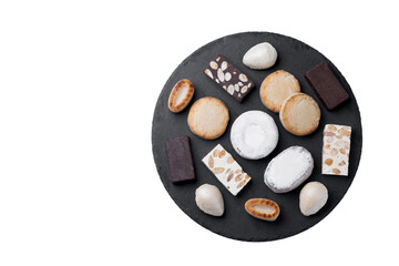 Traditional Spanish Christmas sweets assortment isolated on white background. Top view. Copy space
